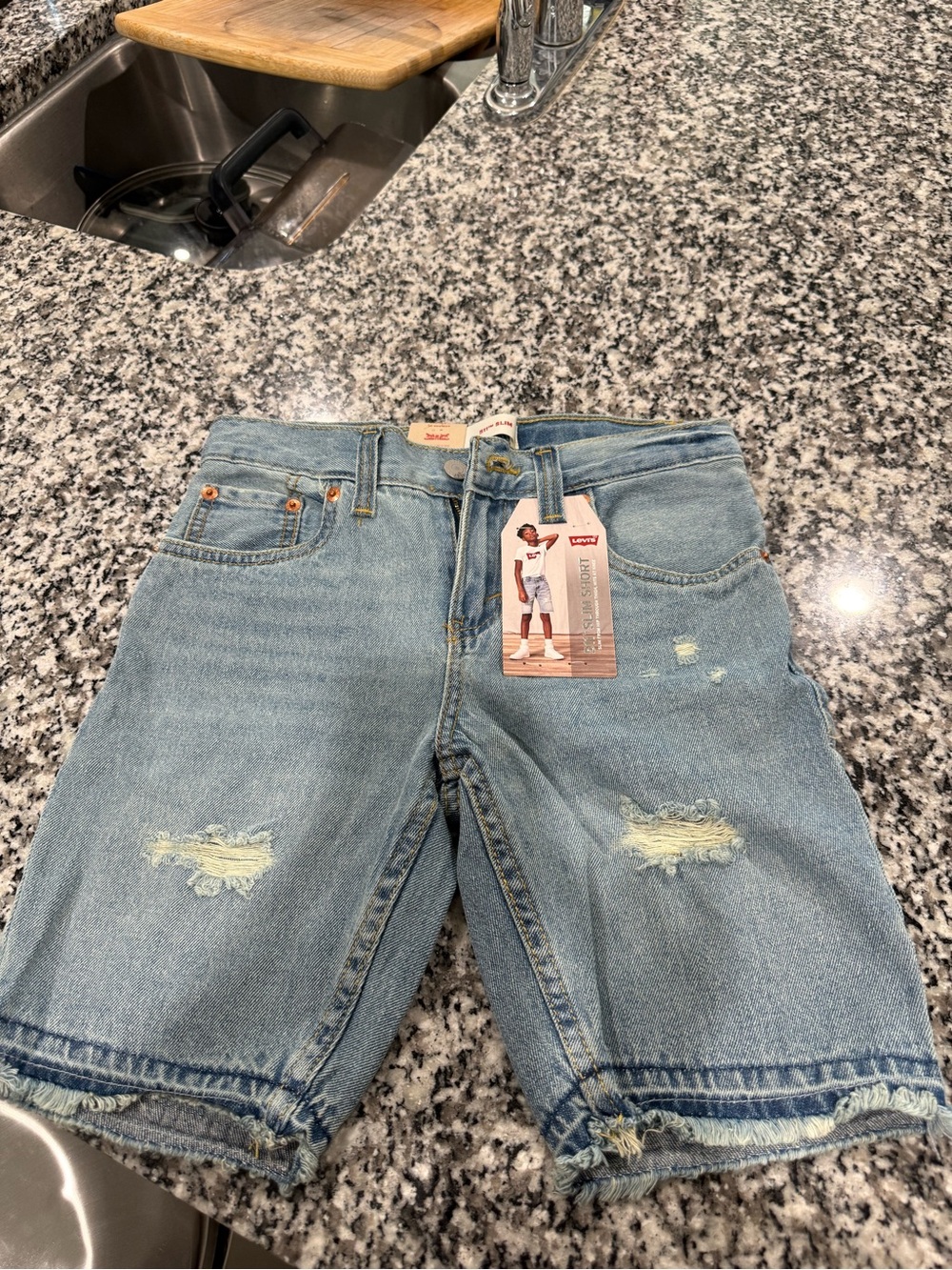 Levi's Men's Light Blue Relaxed Distressed Denim Shorts
